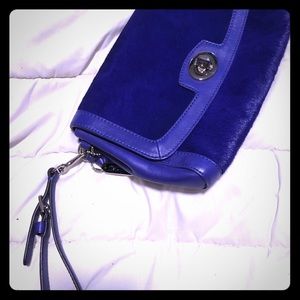 Prominent Purple fur Coach Purse